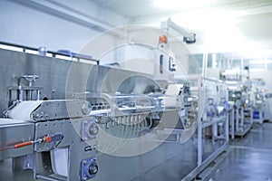 Factory, industrial area, automation, technology, Machines for packing products Within the factory, sterile beauty industry in