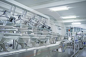 Factory, industrial area, automation, technology, Machines for packing products Within the factory, sterile beauty industry in