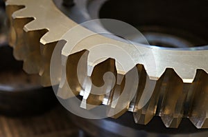 Factory Industrial of brass gear machinery. Metal Gear wheels. Machine part. Closeup