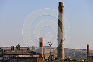 Factory industrial zone of the plant with huge pipes