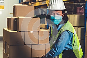 Factory industry worker working with face mask to prevent Covid-19