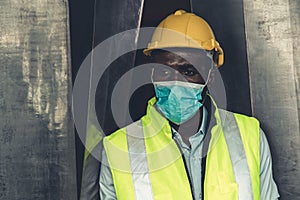 Factory industry worker working with face mask to prevent Covid-19