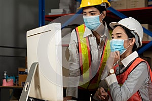 Factory industry worker working with face mask to prevent Covid-19