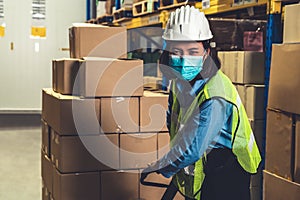 Factory industry worker working with face mask to prevent Covid-19