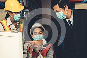 Factory industry worker working with face mask to prevent Covid-19