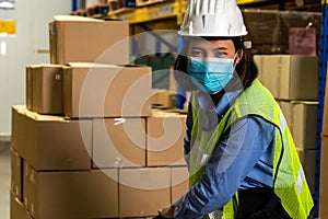 Factory industry worker working with face mask to prevent Covid-19