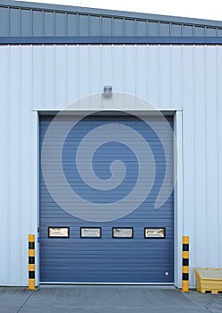 Factory loading bay roller door on industrial building