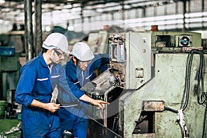 Factory machine maintenance service engineer team worker working together teamwork inspector in factory