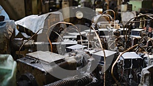 Factory of metal products. Industrial machine tool equipment, close up. The aggregate machine processes metal parts with a cooling
