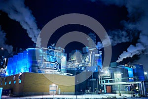 Factory at Night Air Pollution From Industrial Smoke