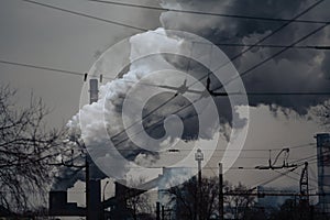 Factory pipe polluting air against, environmental problems, smoke from chimneys