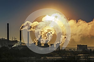 Factory pipe polluting air photo