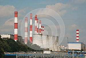 Factory pipes on a background of a city landscape of a city of Moscow.