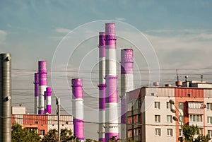 Factory pipes on a background of a city landscape of a city of Moscow