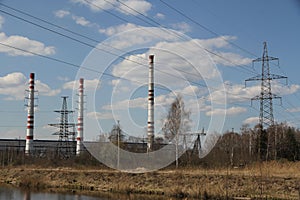 Factory pipes and high voltage power lines