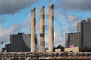 Factory pipes on a sky background