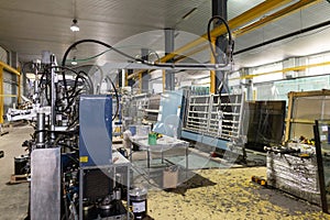 Factory for the production of double-glazed windows made of sheet glass. A Insulating glass line the production of coated