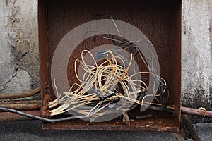 factory roof. box for wires and cables, crowded with interconnected wires.