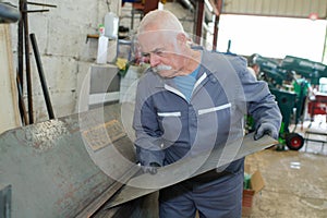 factory senior worker on manufacture workshop