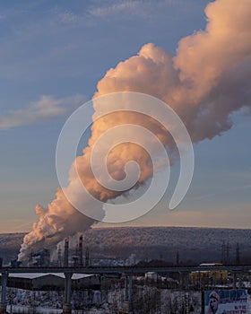 Factory smoke pipe sending smoke to the atmosphere