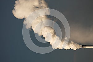 Factory smokestack and smoke photo