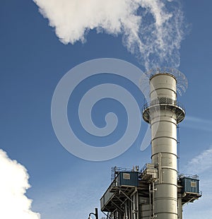 Factory smokestack with smoke