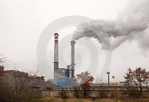 Factory, two smoking chimneys