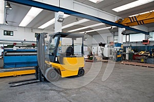 Factory warehouse with forklift