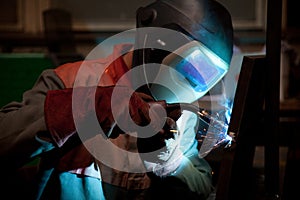Factory welder at work