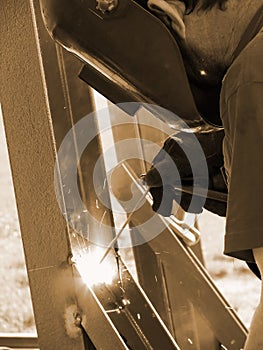 Factory welder at work