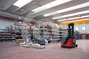 Factory wharehouse with forklift photo