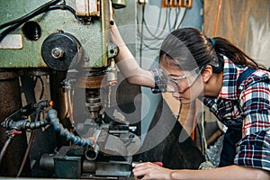 Factory woman wearing safety protection glasses