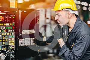 Factory worker man operate the machine, high skill labor work industry with safety clothes