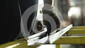 Factory Worker Preparing A Construction Reinforcement Product