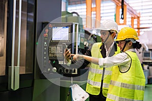 Factory workers check productivity in tablet