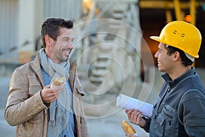 Factory workers having lunch