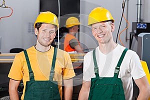 Factory workers at production area