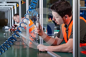 Factory workers and production process photo