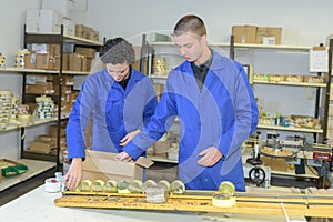 factory workers in storage room