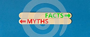 Facts or myths symbol. Concept word Myths and Facts on beautiful wooden stick. Beautiful blue table blue background. Business and