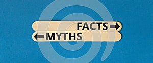 Facts or myths symbol. Concept word Myths and Facts on beautiful wooden stick. Beautiful blue table blue background. Business and