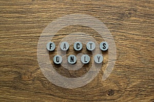 Facts only - word concept on building blocks, text