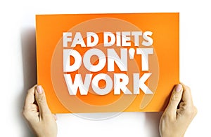 Fad Diets Don`t Work text quote, concept on card