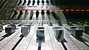 Faders on a Mixing Board