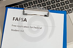 Fafsa. Student aid application form on the tablet.