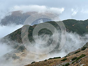 Fagaras Mountain in a cloudy day around Valea Rea path photo