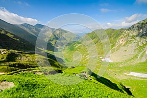 Fagaras mountains, Carpathians with green grass and rocks, Peaks Negoiu and Moldoveanu, Romania, Europe photo