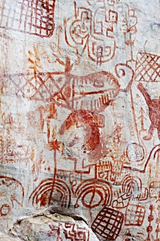 l cave paintings in San Ignacio Cajamarca Peru with hunters and warriors used boleadora stones with an antiquity of 5000 to photo