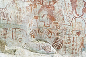 cave paintings in San Ignacio Cajamarca Peru with hunters and warriors used boleadora stones with an antiquity of 5000 to photo