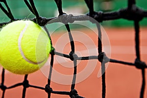 Failure defeat concept - tennis ball in the net